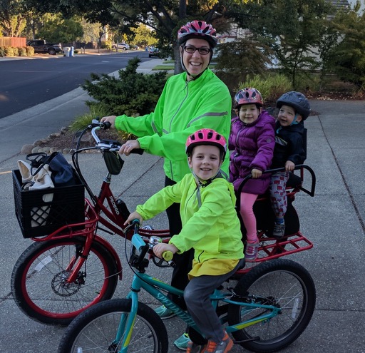Kids and mother on pedego stretch