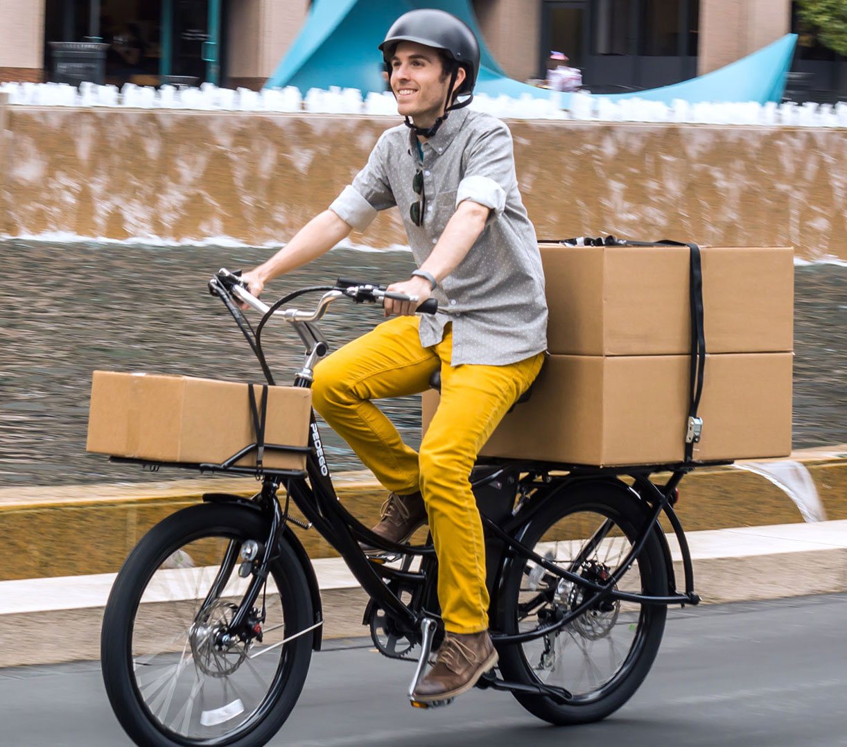 guy using electric bike to carry cargo