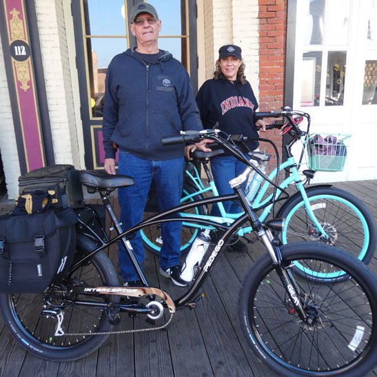 Rick and Marleena with electric bikes